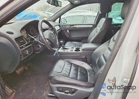 2014 Volkswagen Touareg V6 z USA, uszkodzony, nr VIN WVGDF9BP3ED006854